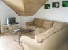 Wohnbereich mit Sitzecke und Sat-TV mit DVD-Player und Radio