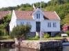Ferienhaus Malakka liegt traumhaft in einer geschützen Bucht vor Farsund. Norwegische Idylle pur!