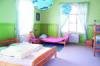 Schlafzimmer mit mit 1 Doppel-, 1 Einzel- und 1 Etagenbett