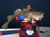 Unser Gast Hagen Hager mit einem gigantischen Dorsch von 21kg in Flateyri
