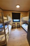 Eines der Schlafzimmer im Rorbu