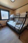 Eines der Schlafzimmer im Rorbu