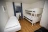 Ap. Sklinna - Schlafzimmer mit Familien- und Einzelbetten.