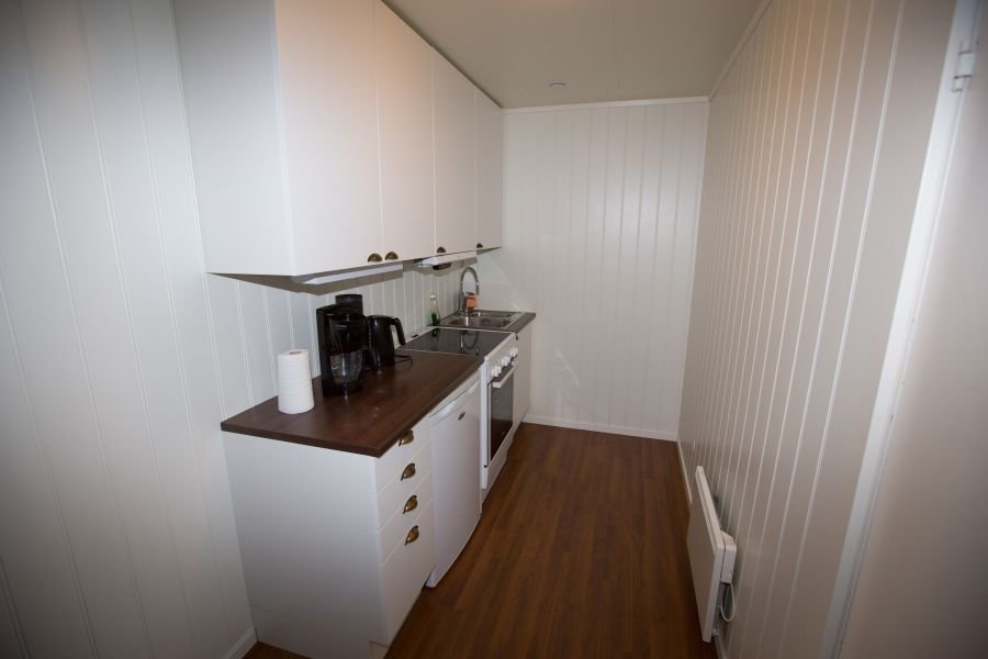 Voll ausgestattete Küchenzeile in einem der Apartments.