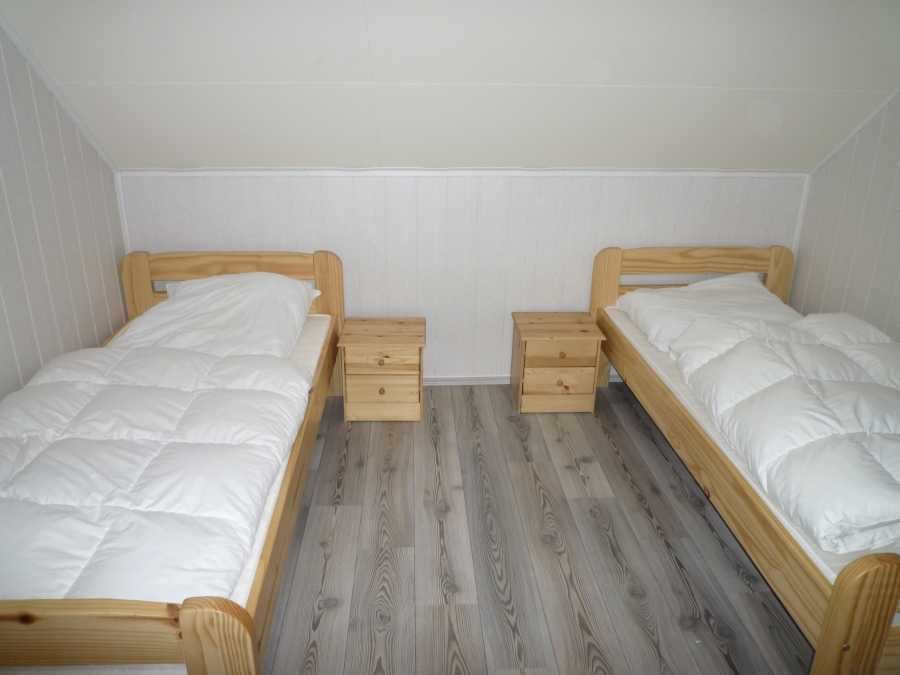 Eins der Schlafzimmer mit Einzelbetten