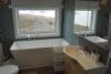 In der Badewanne vom Sjøhus können Sie nach einem anstrengenden Angeltag relaxen