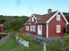 Ferienhaus >Fjeldet< liegt innerhalb der geschützten Schären vor dem Ort Farsund