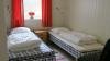 Das zweite Schlafzimmer mit zwei Einzelbetten