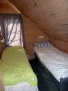 Das zweite Schlafzimmer mit zwei Einzelbetten - auch hier können die Betten bei Bedarf zum Doppelbett zusammengeschoben werden