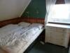 Das dritte Schlafzimmer mit einem Doppelbett