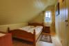 Eins der Schlafzimmer im OG