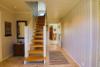 Der Flur mit Treppe in OG