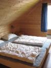 Eines der 4 Schlafzimmer mit je zwei Einzelbetten in den Ferienhäusern 3 oder 4 - zusammengeschoben können die Betten als Doppelbett genutzt werden.