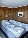 Das Schlafzimmer mit einem Doppelbett im Annex