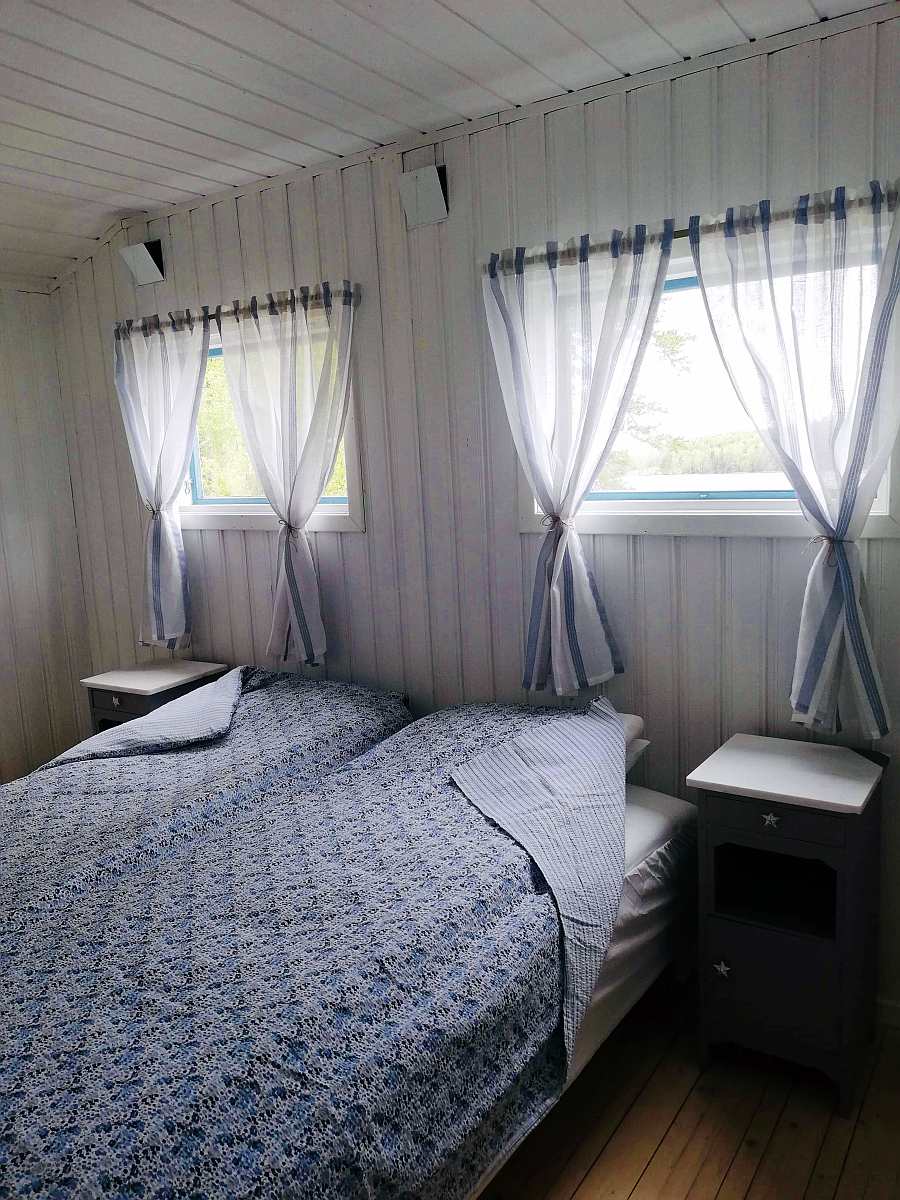 Das Schlafzimmer mit zwei Einzelbetten - diese können zum Doppelbett zusammen gestellt werden.