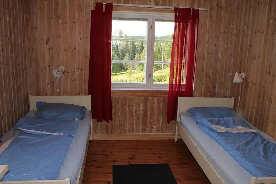 Eines der vier Schlafzimmer - hier mit zwei Einzelbetten