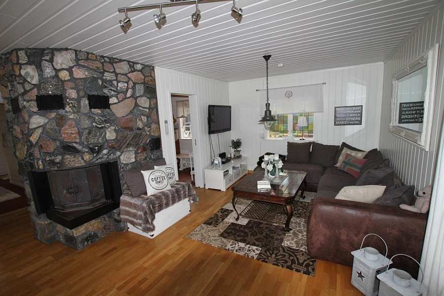 Der Wohnbereich des Hauses mit Kaminofen (offen oder geschlossen zu betreiben)