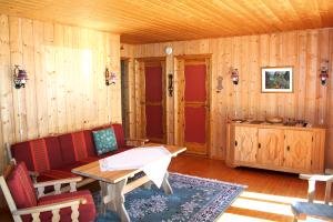 Wohnbereich des Ferienhauses. Sat-TV mit vielen deutschen Programmen verfügbar Wohnbereich des Ferienhauses. Sat-TV mit vielen deutschen Programmen verfügbar