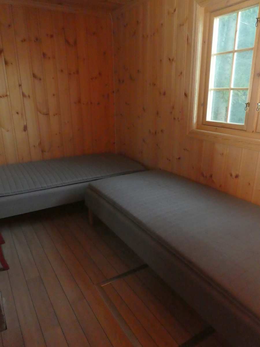 Das Schlafzimmer des Hauses mit 3 Einzelbetten - zwei davon  sind auf Wunsch zum Doppelbett zusammenstellbar