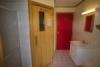 Badezimmer mit Sauna im Typ Haus